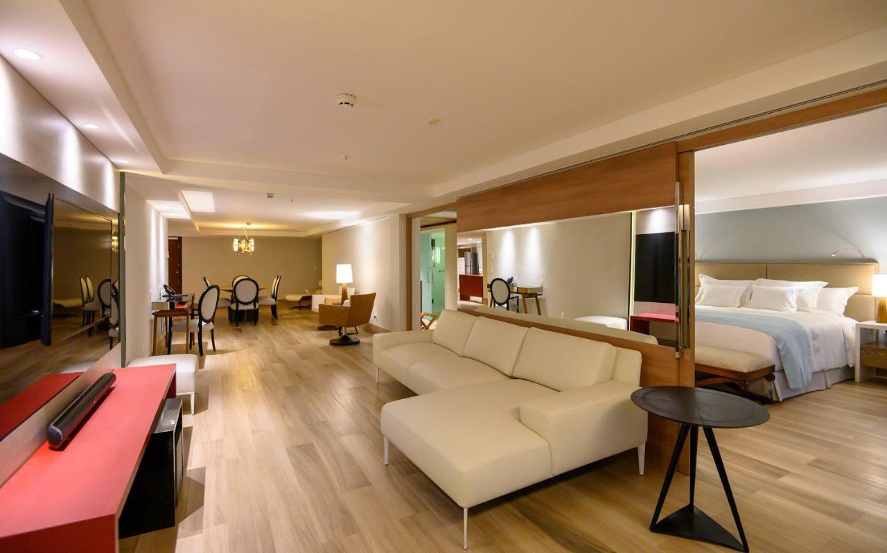 Vogal Luxury Beach Hotel & Spa Natal Exterior photo A suite at the hotel
