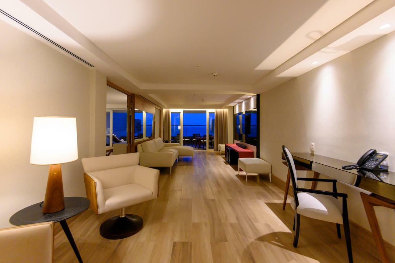 Vogal Luxury Beach Hotel & Spa Natal Exterior photo A suite at the hotel